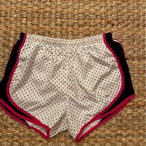 Variety of Nike and Patagonia athletic shorts
